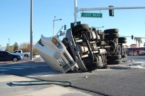 tractor-trailer flipped over in an intersection